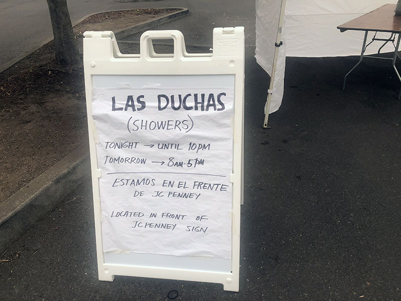 Sign reads: Las Duchas (Showers)