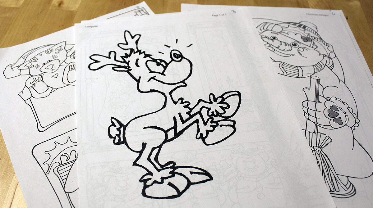 Coloring pages featuring illustrations such as a reindeer and a snowman