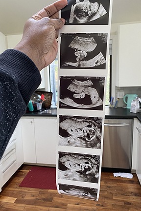 A photo of Donovan Scribes holding up a sonogram of his child expected in June.