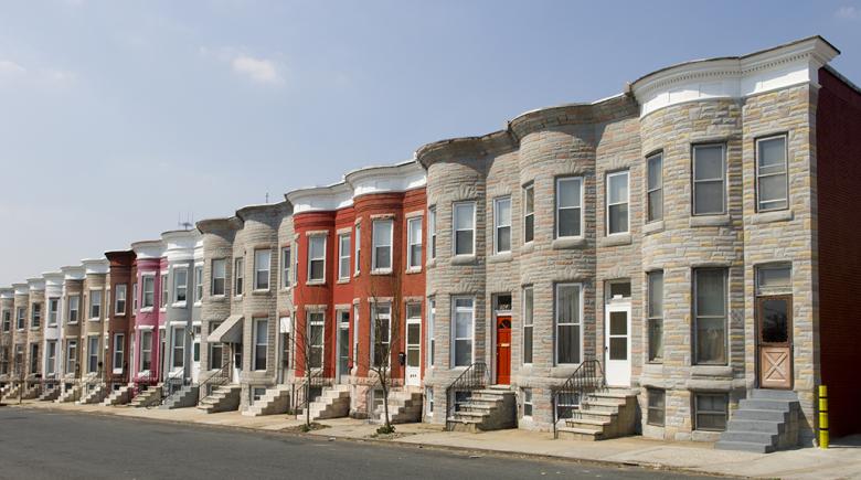 A row of houses painted vibrants colors.