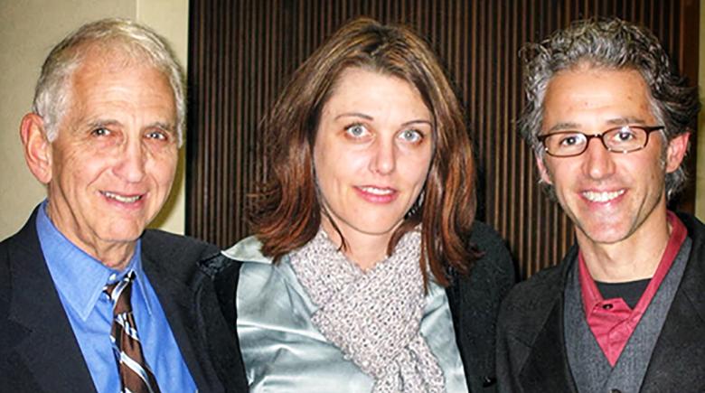 Daniel Ellsberg, Kaia Sand and Jules Boykoff pose for a photo together.