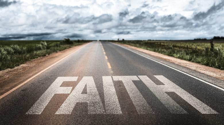 A street with the word "faith"written on it