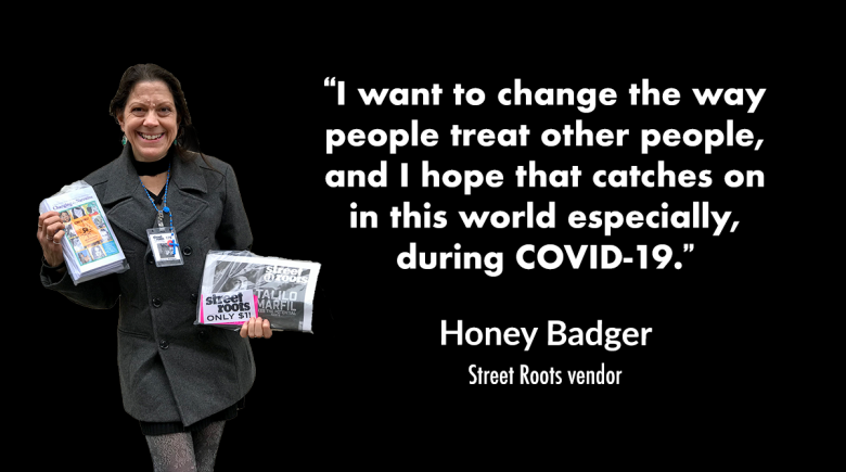 A photo of vendor Honey Badger smiling and holding up a stack of comic booklets and Street Roots newspapers.