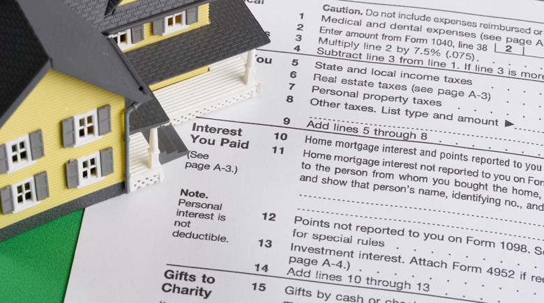 Illustration of a house along with tax returns