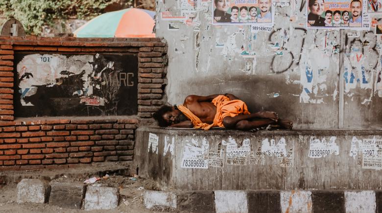 Homeless person sleeps outdoors