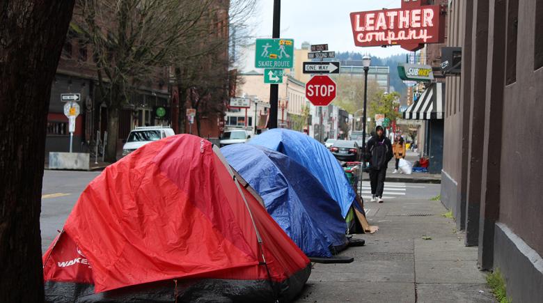 Tents on a sidewalk in Old Town