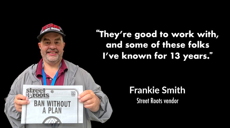 Street Roots vendor Frankie smiles for a photo while holding up a newspaper.