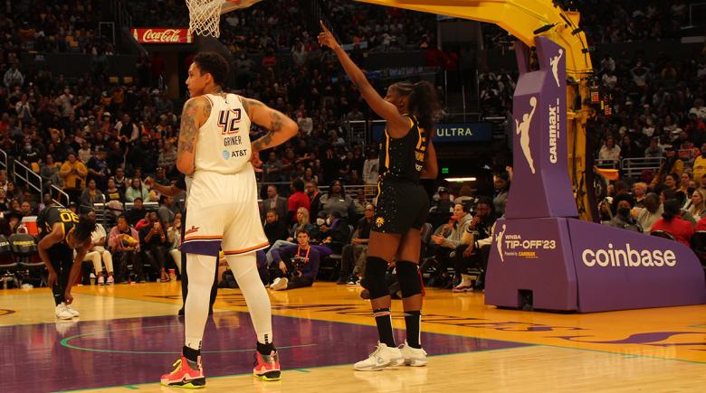 Brittney Griner stands on a basketball court during a game.