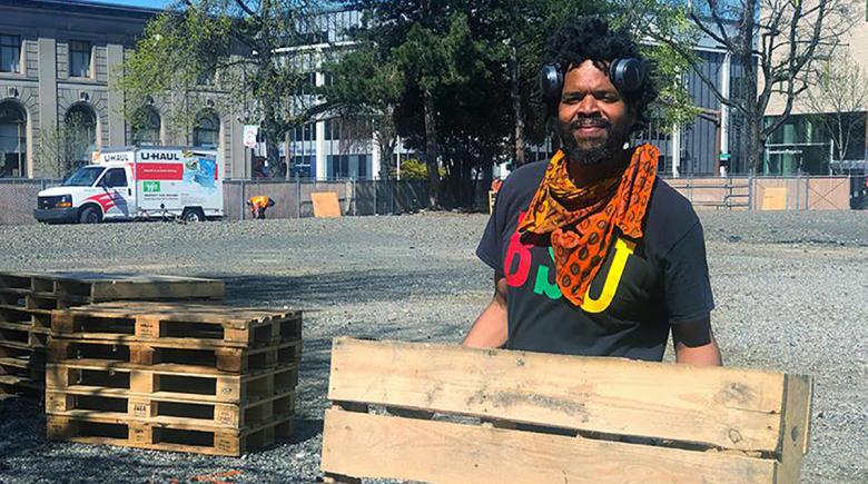 Nyanga Uuka helps build the camp in Old Town