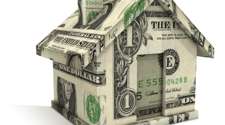 Illustration of house made of dollar bills
